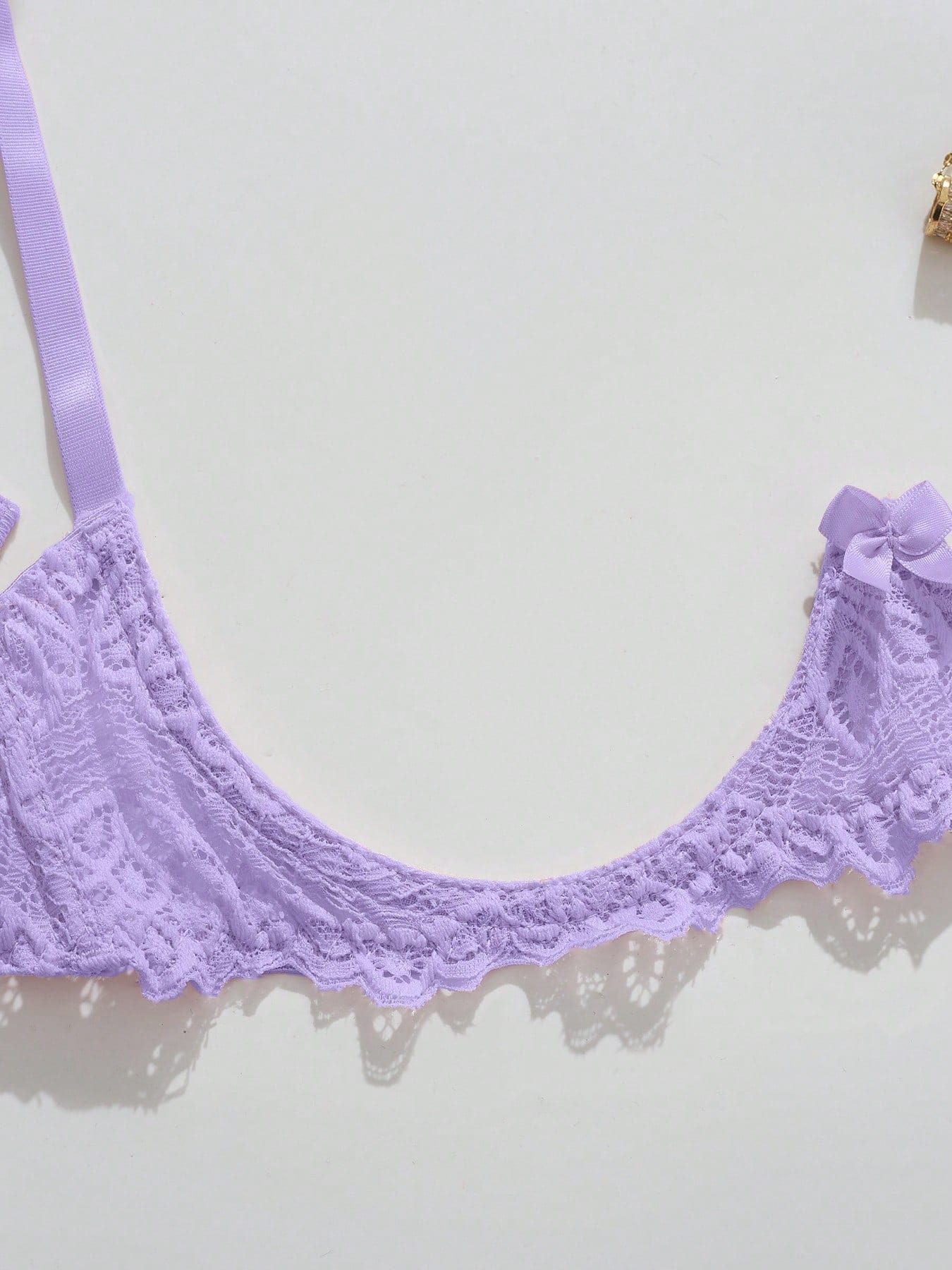 Women's lace bra and panty set with underwire bra, adjustable straps, 3/4 cup design, and matching thong panty in a sheer 2-piece lingerie style.