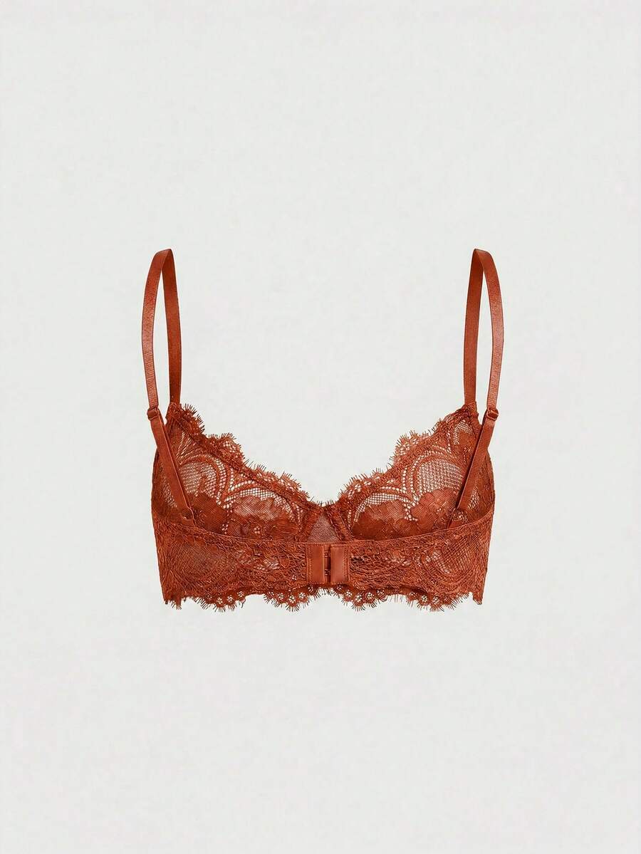 Black sheer floral lace plunge bra featuring underwire support, unlined triangle cups, adjustable straps, and a backless design for women.