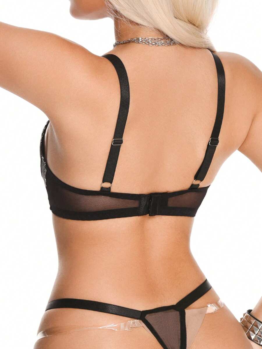 Black 2-piece goth lingerie set featuring a sheer mesh underwire bra with heart-shaped rhinestone detail and a matching low-rise thong.