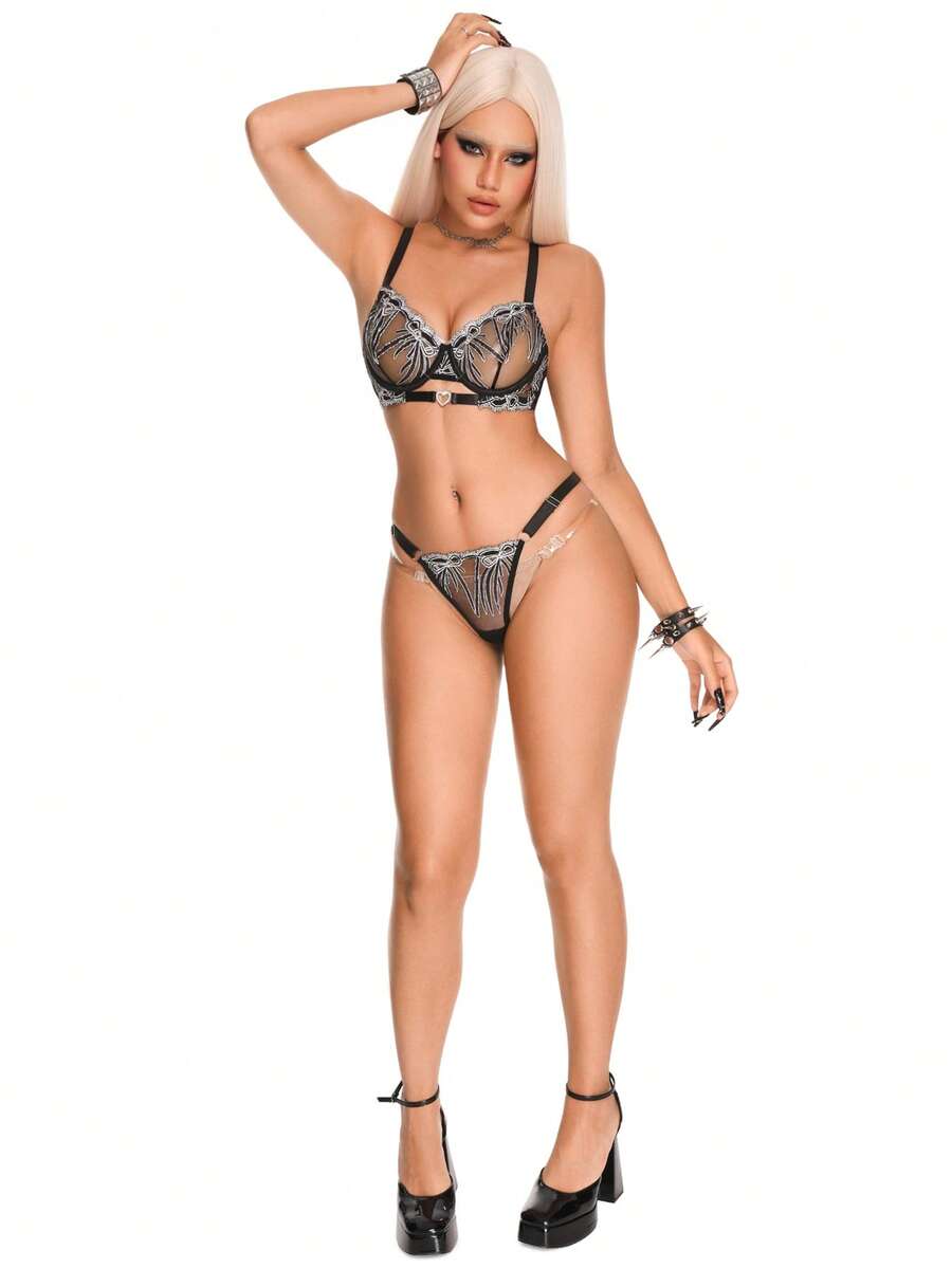 Black 2-piece goth lingerie set featuring a sheer mesh underwire bra with heart-shaped rhinestone detail and a matching low-rise thong.