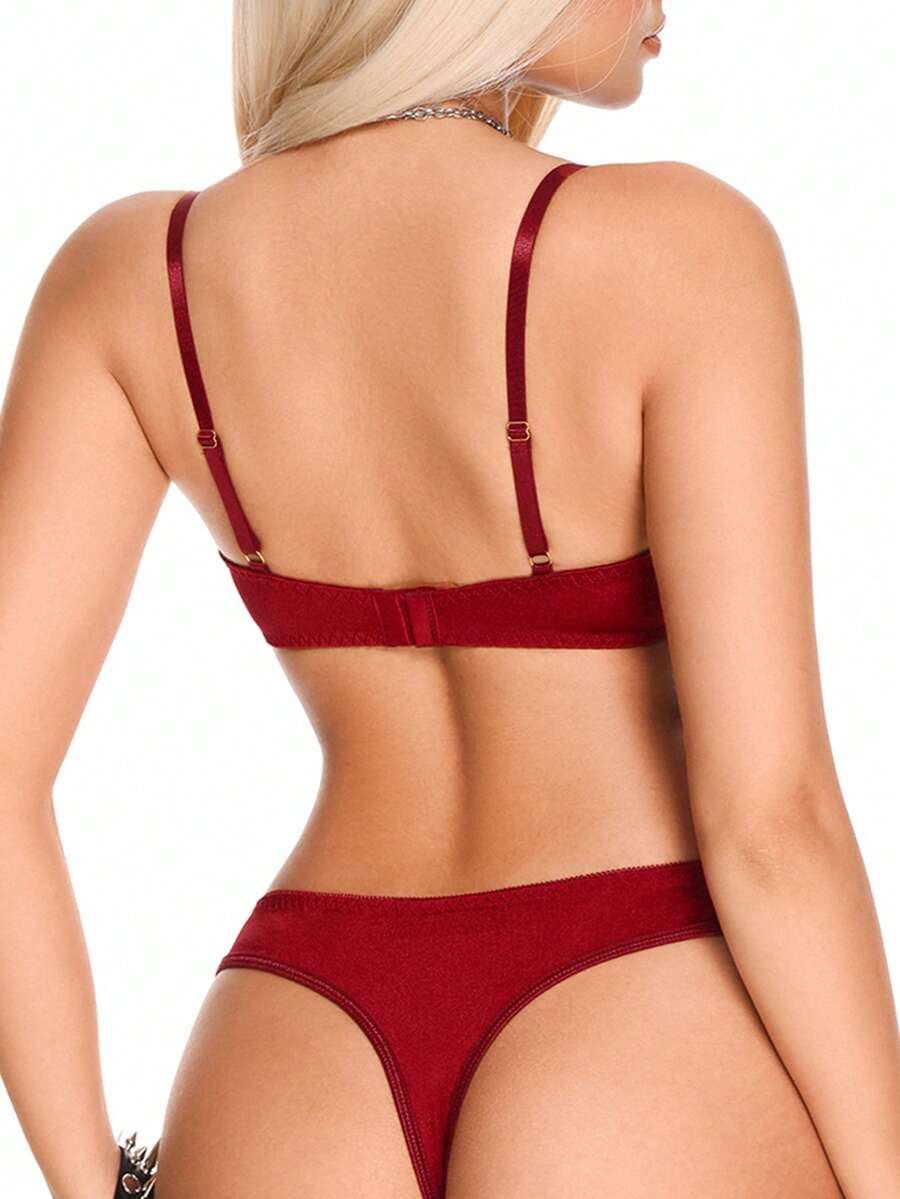 Burgundy lace trim lingerie set for women featuring a goth backless underwire bra with bow decor and adjustable straps paired with a low rise matching thong panty.