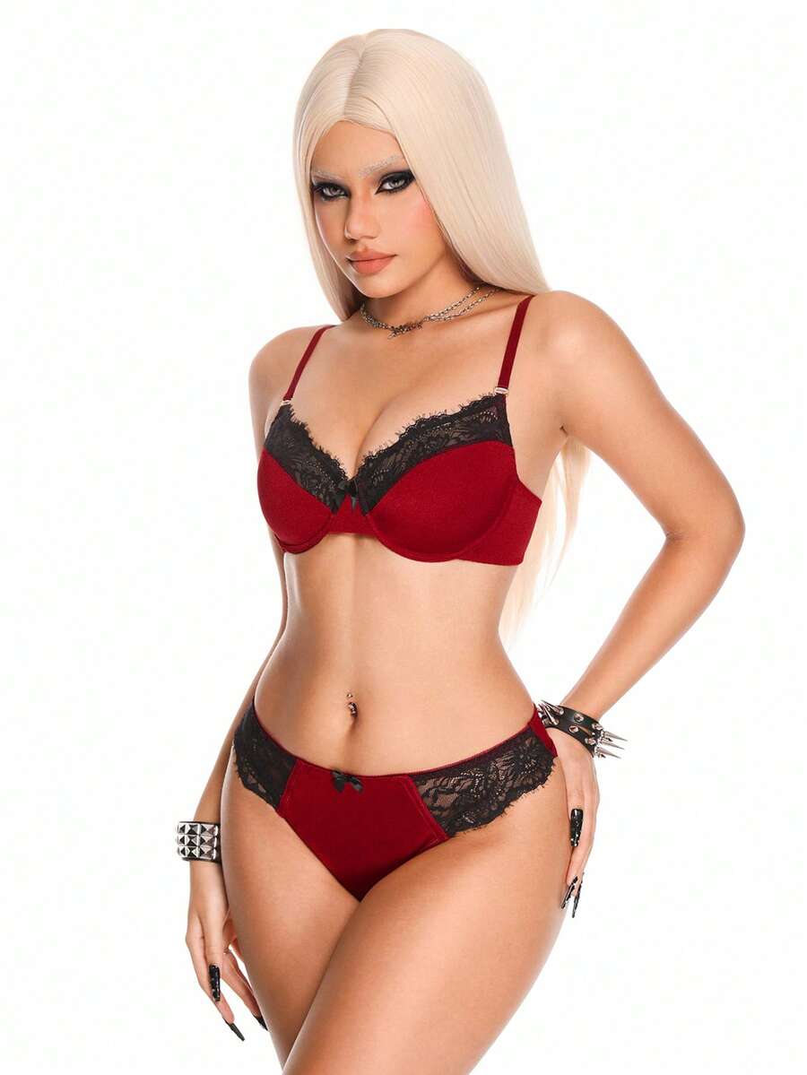Burgundy lace trim lingerie set for women featuring a goth backless underwire bra with bow decor and adjustable straps paired with a low rise matching thong panty.