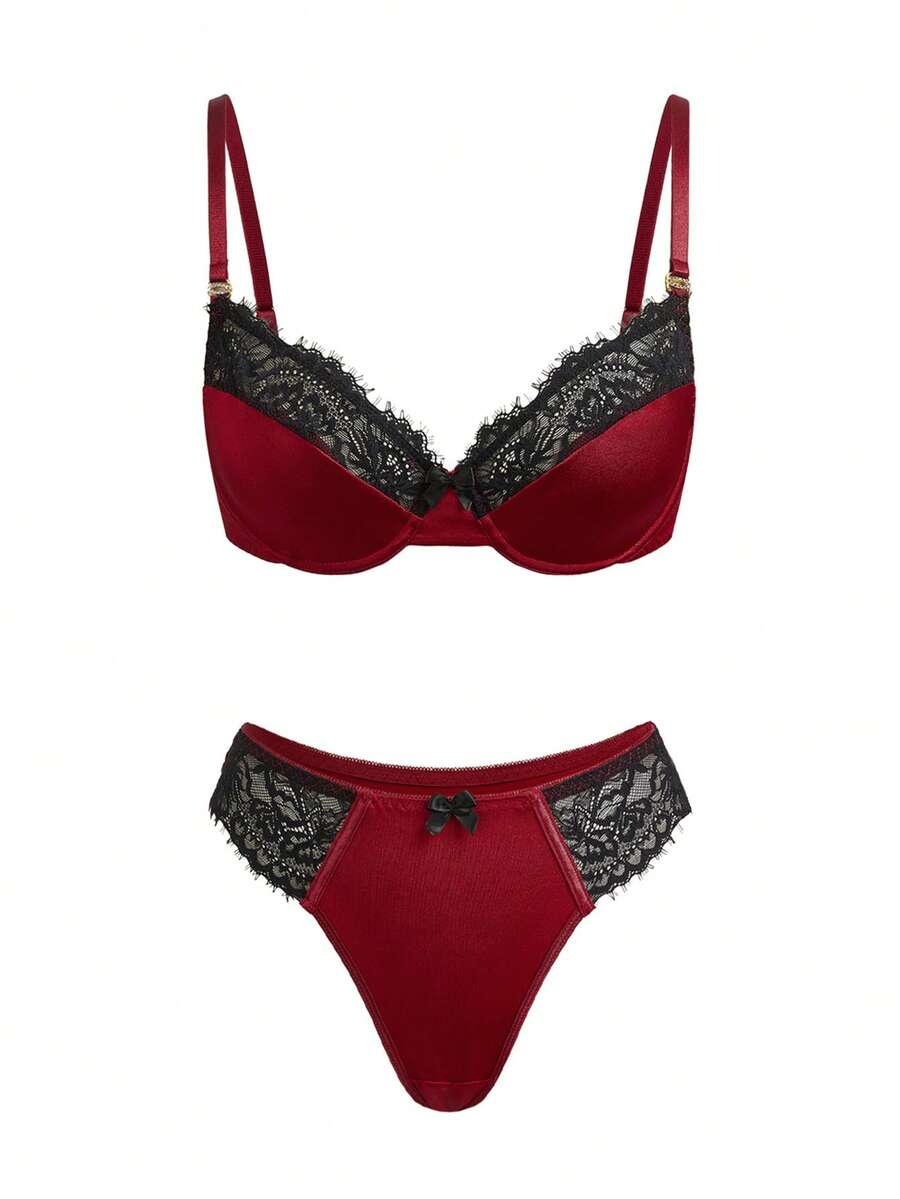 Burgundy lace trim lingerie set for women featuring a goth backless underwire bra with bow decor and adjustable straps paired with a low rise matching thong panty.