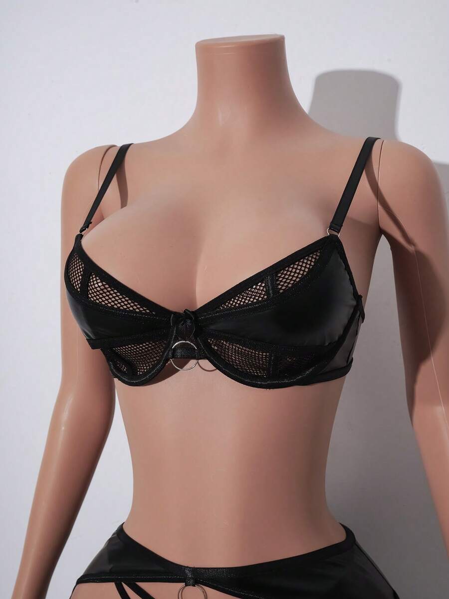 Black 4-piece mesh and PU leather goth lingerie set for women featuring underwire cup detail, backless design, adjustable spaghetti straps, short skirt, and thong.