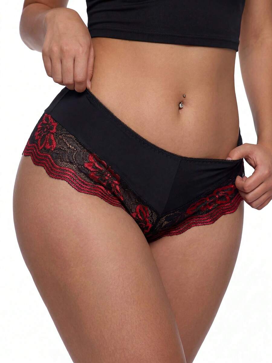 Black and red lace patchwork low rise thong panty for women featuring sheer goth style lace and high stretch fabric.