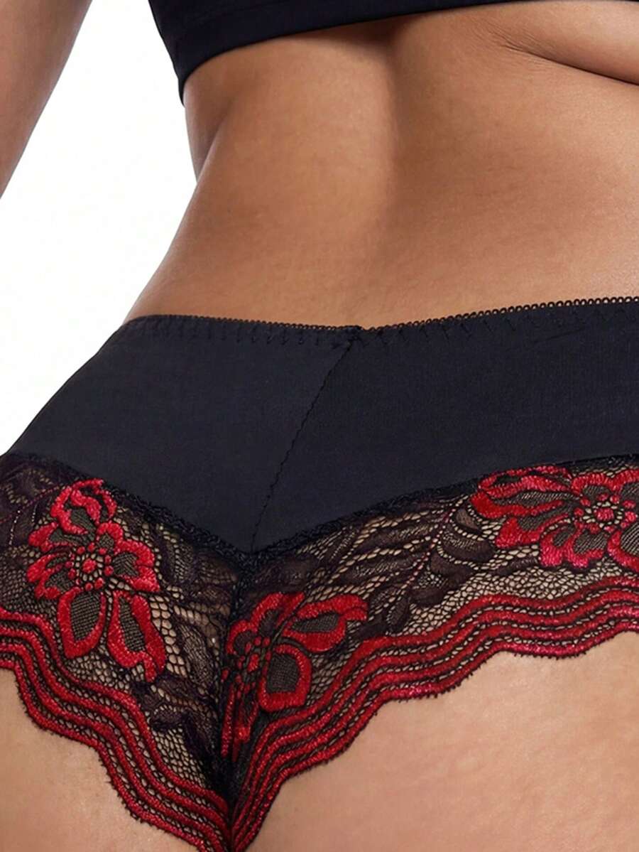 Black and red lace patchwork low rise thong panty for women featuring sheer goth style lace and high stretch fabric.