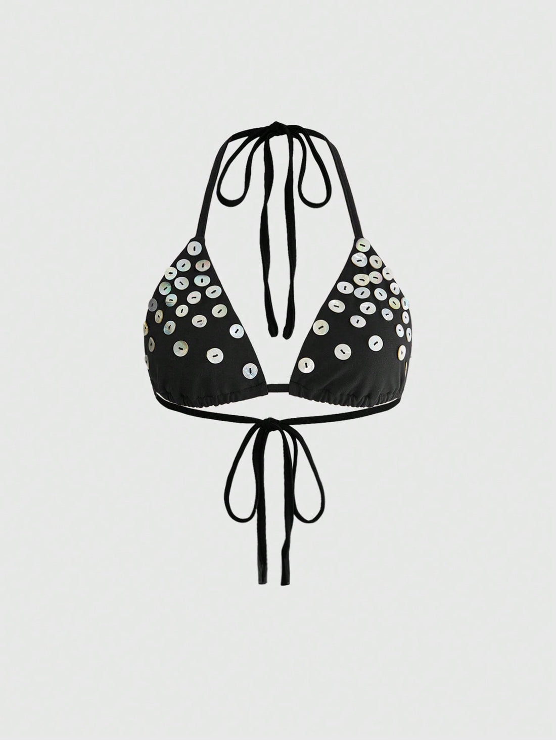 Women's black knitted halter micro crop top featuring studded details, high stretch fabric, and an asymmetrical hem.