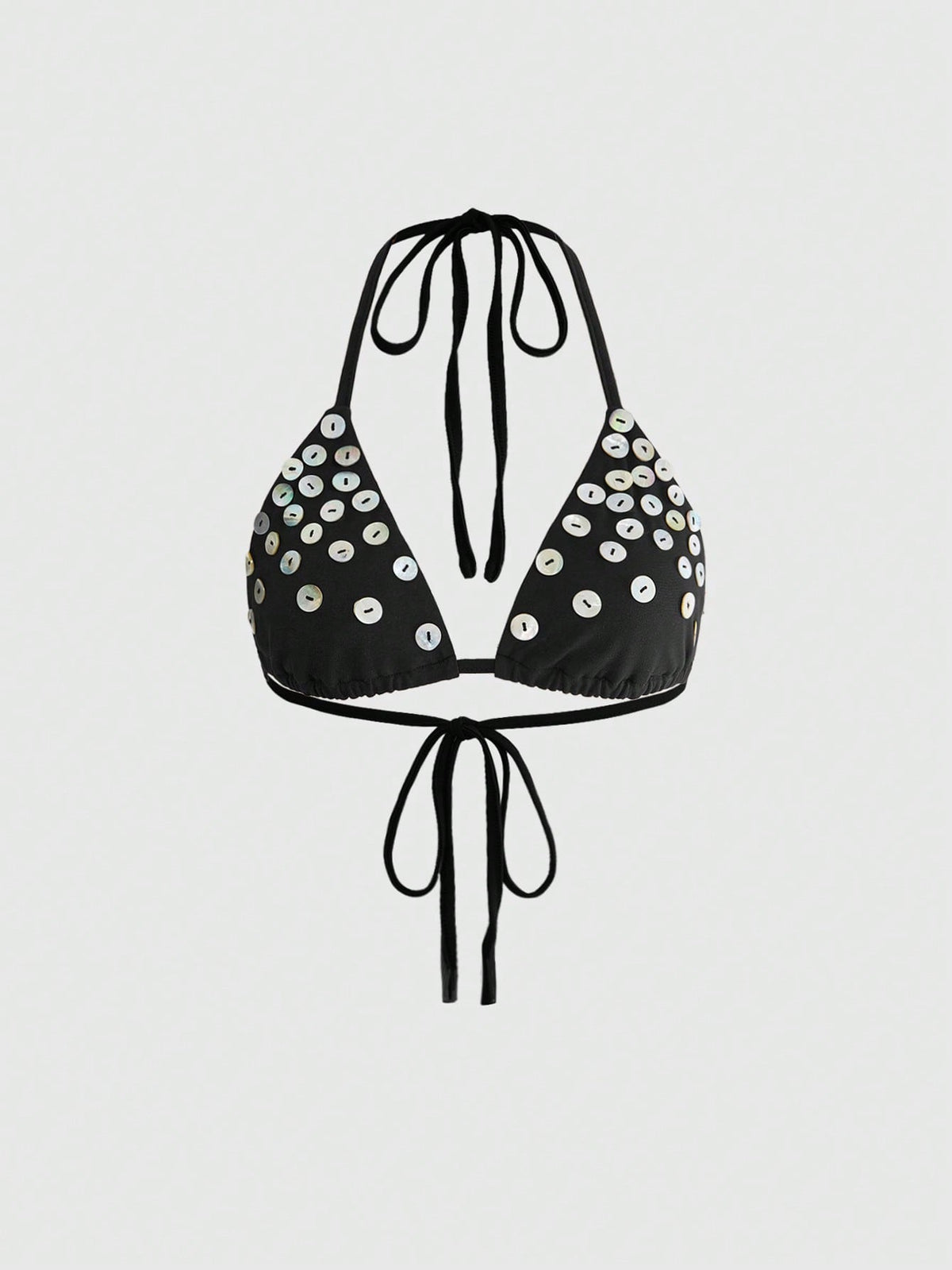 Women's black knitted halter micro crop top featuring studded details, high stretch fabric, and an asymmetrical hem.
