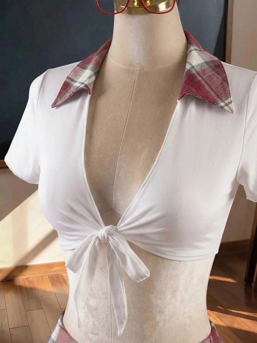 Women's student role play 3-piece costume set featuring a plaid short pleated skirt, collared top with front knot detail, and matching socks.