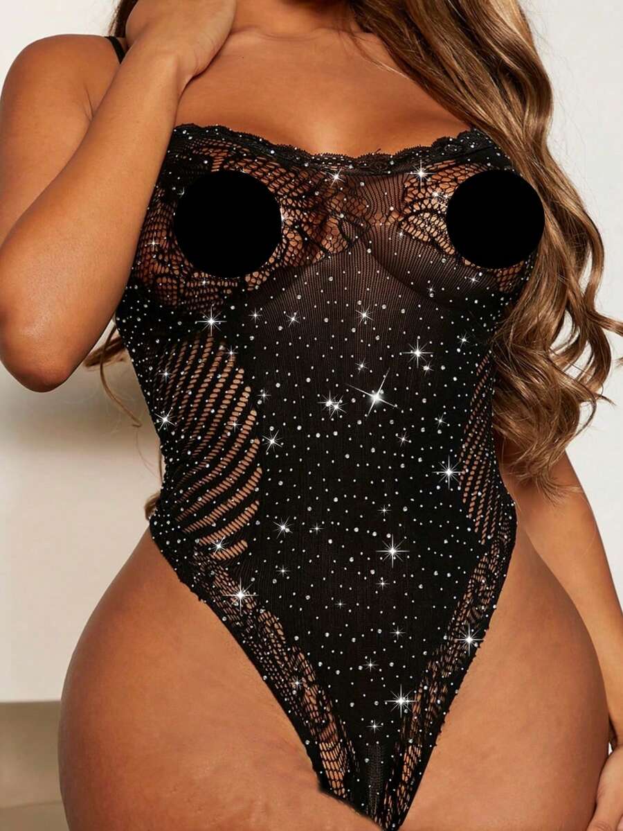 Black sheer hollow-out rhinestone full body lingerie bodysuit for women featuring high stretch fabric and a fantasy-gorgeous design.