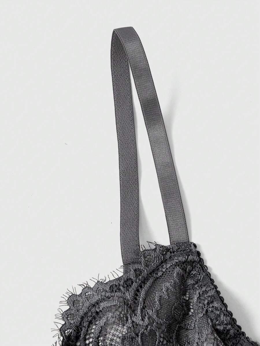 Black sheer floral lace plunge bra featuring underwire support, unlined triangle cups, adjustable straps, and a backless design for women.