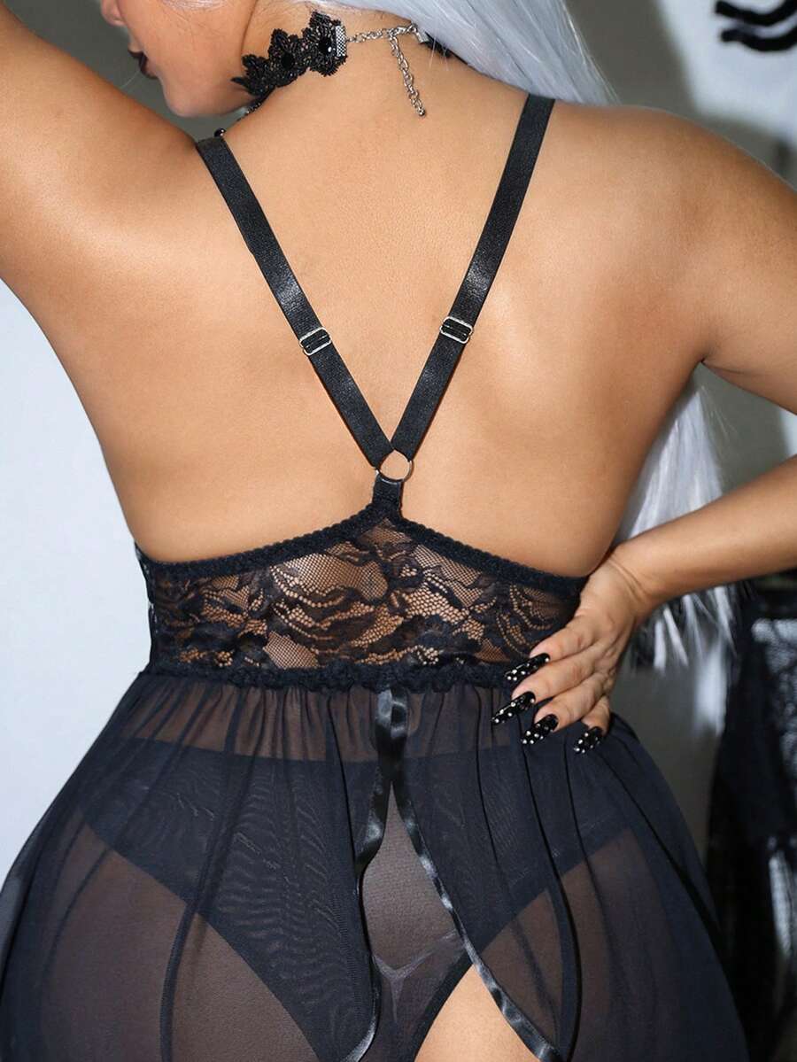 Plus size black lace trim mesh patchwork camisole and panties 2-piece set featuring adjustable straps and backless wireless design.