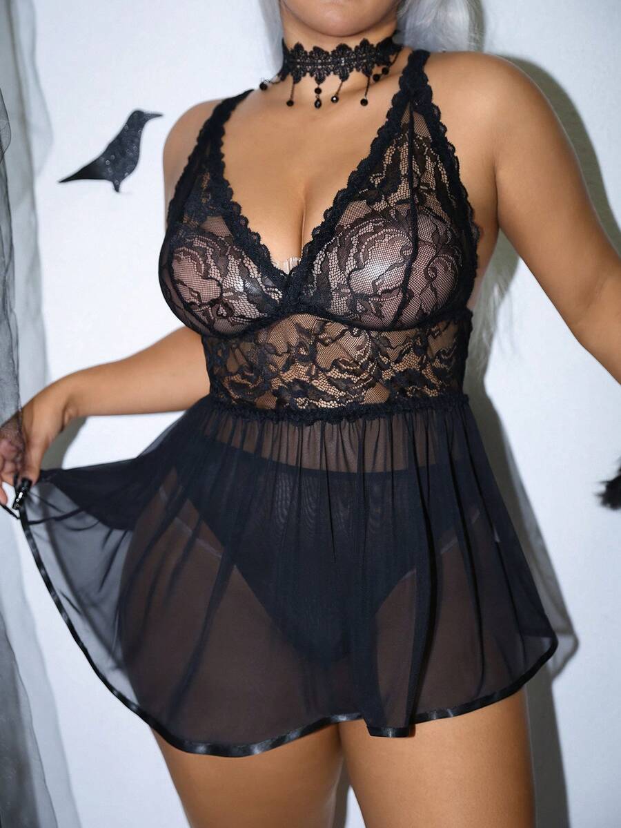 Plus size black lace trim mesh patchwork camisole and panties 2-piece set featuring adjustable straps and backless wireless design.