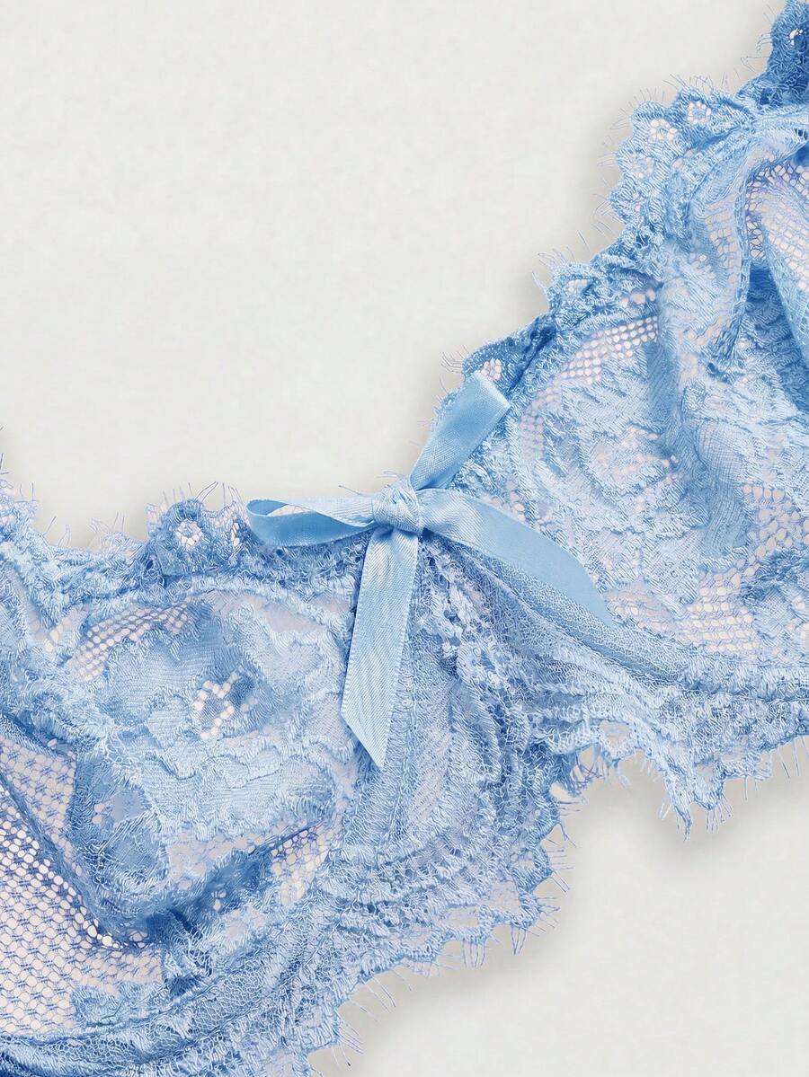 Black sheer floral lace plunge bra featuring underwire support, unlined triangle cups, adjustable straps, and a backless design for women.