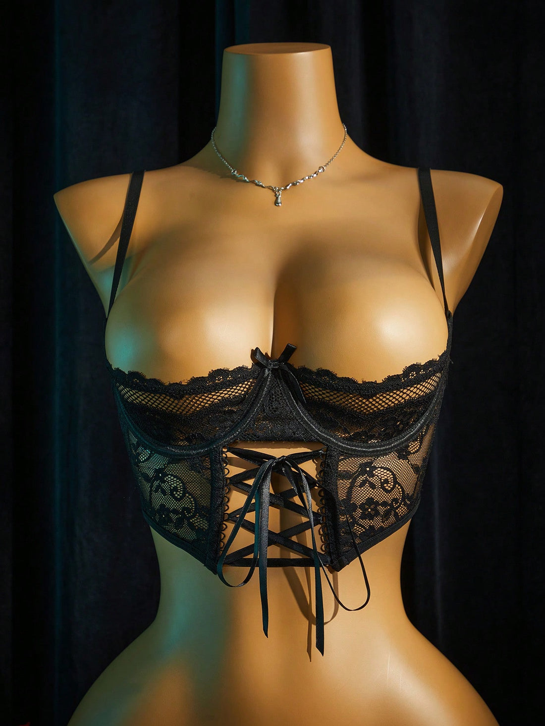 Women's sheer lace bralette lingerie set featuring a longline spaghetti strap bra top and matching mid-rise thong panty.