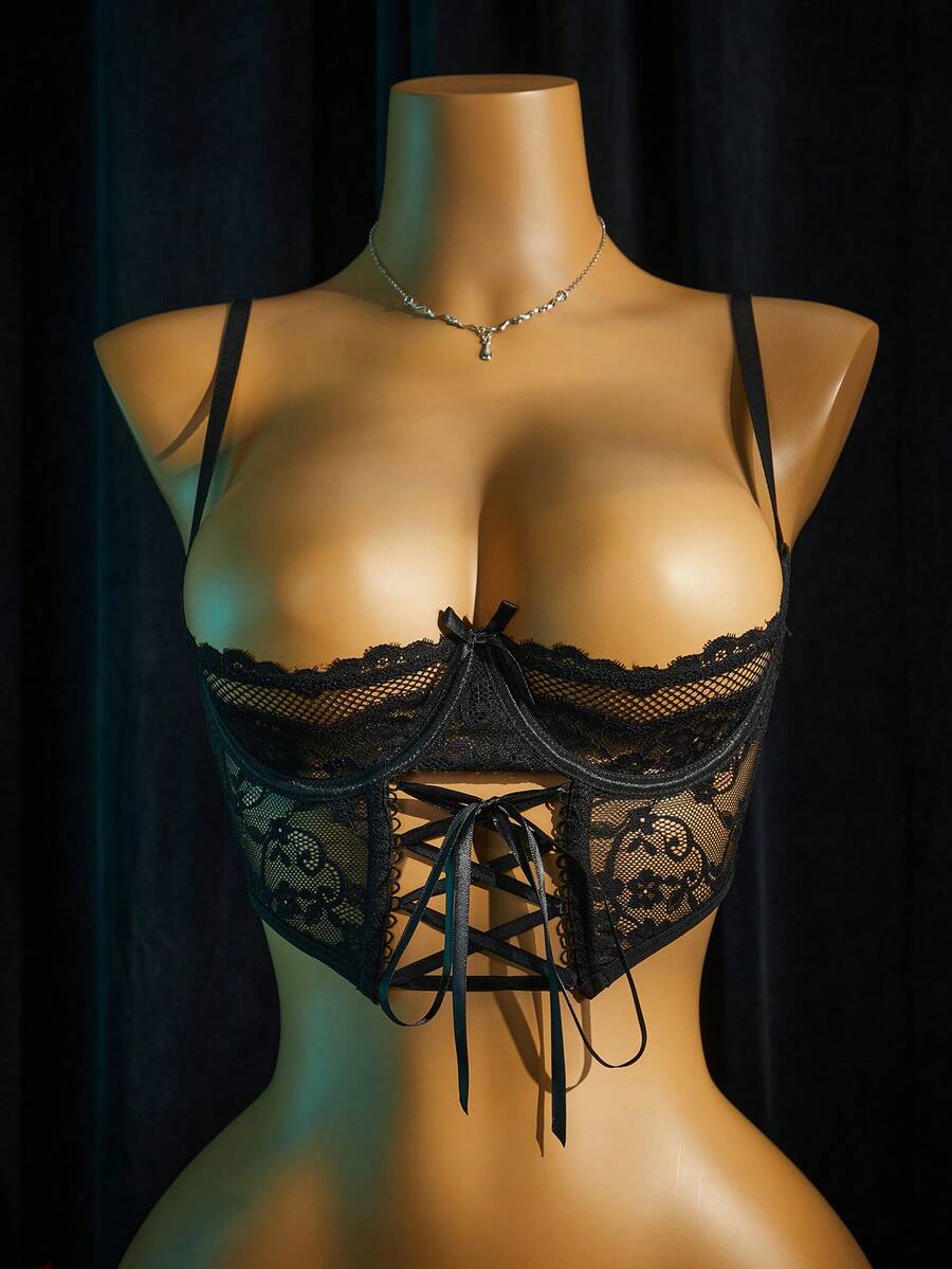 Women's sheer lace bralette lingerie set featuring a longline spaghetti strap bra top and matching mid-rise thong panty.