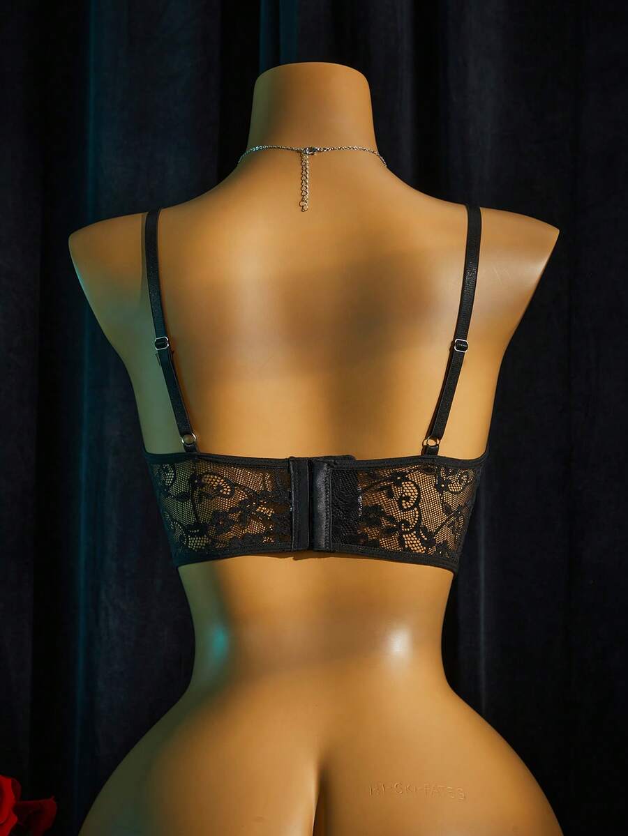Women's sheer lace bralette lingerie set featuring a longline spaghetti strap bra top and matching mid-rise thong panty.
