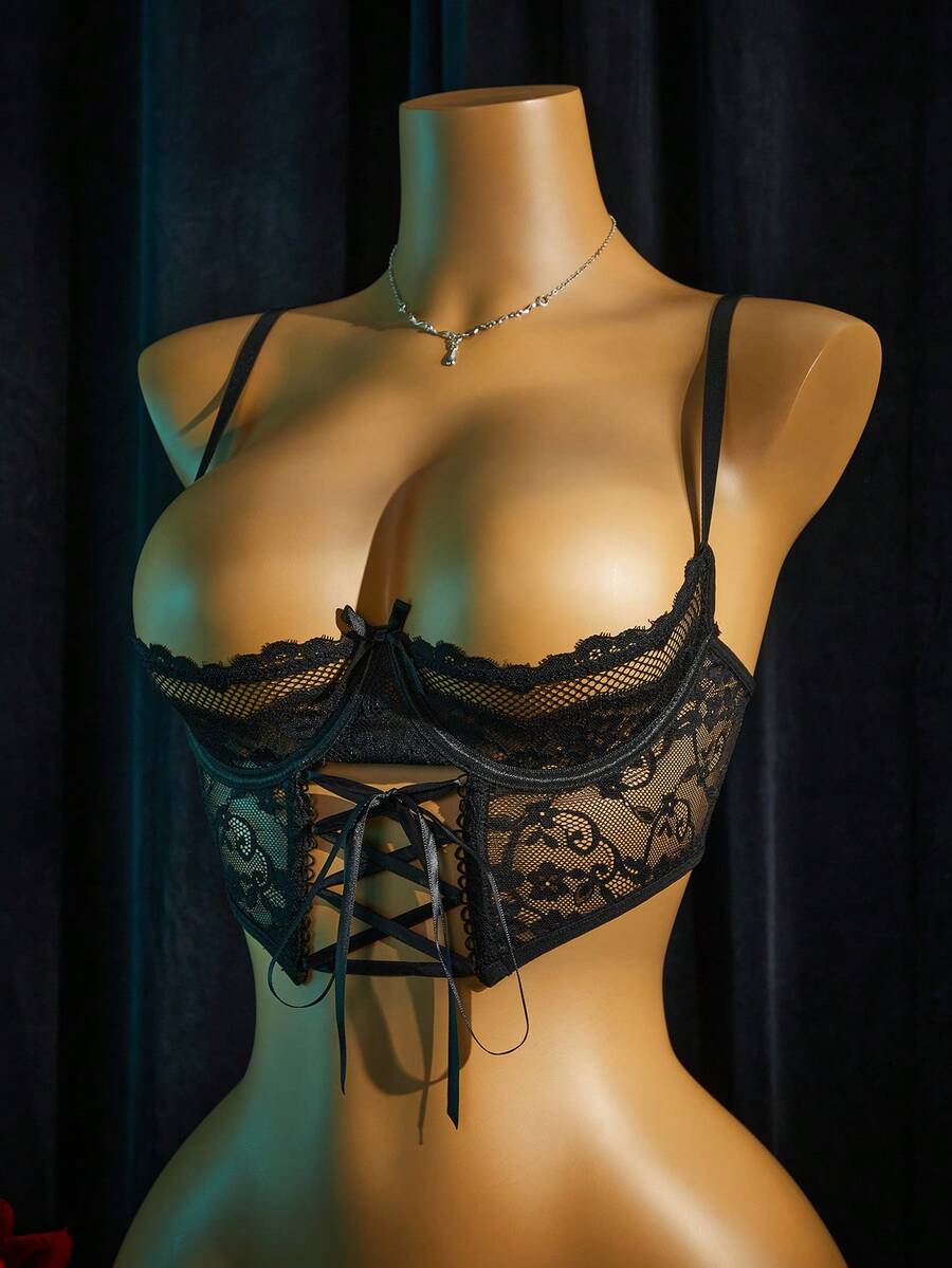 Women's sheer lace bralette lingerie set featuring a longline spaghetti strap bra top and matching mid-rise thong panty.