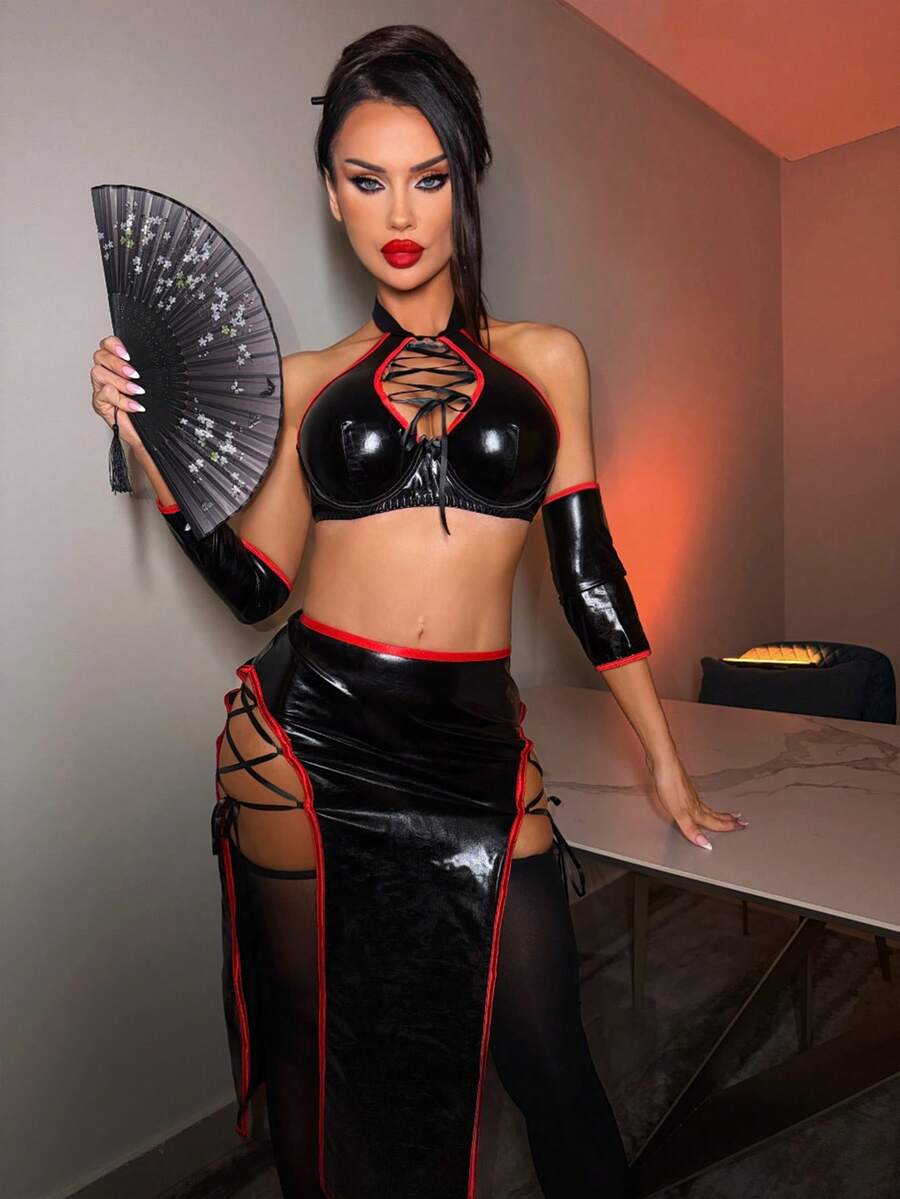 Women's 5-piece black ninja costume set featuring a halter top, lace-up split midi skirt, face mask accessory, gloves, and socks.
