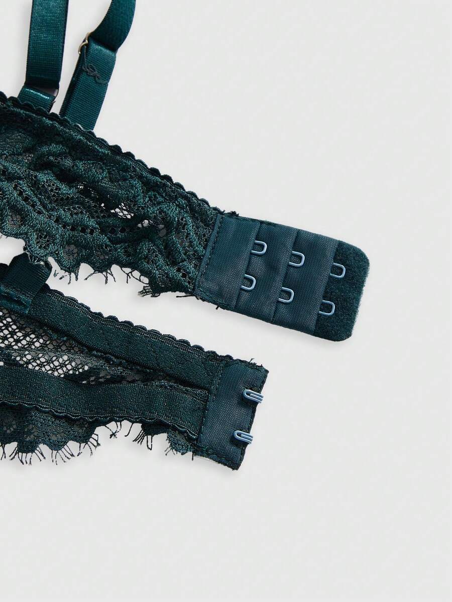 Black sheer floral lace plunge bra featuring underwire support, unlined triangle cups, adjustable straps, and a backless design for women.