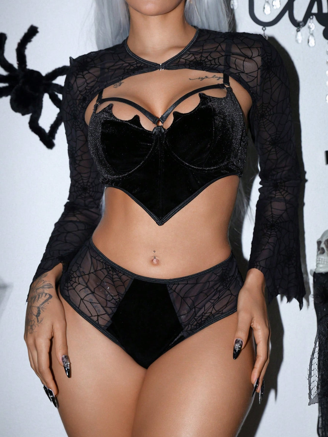 Black 3-piece women's lingerie set featuring an underwire bra with cup details, adjustable spaghetti straps, and mid-rise briefs.