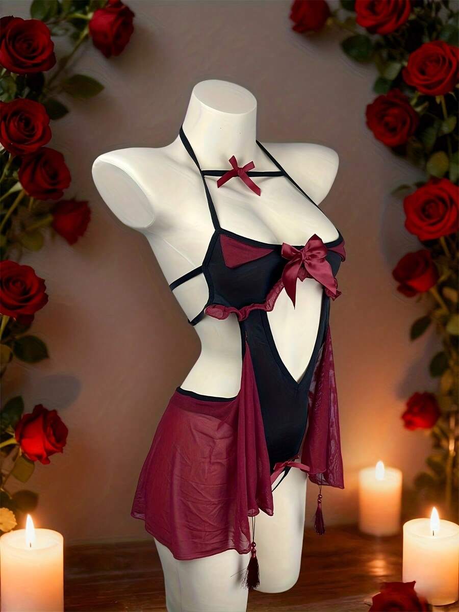 Red hollow-out devil lingerie set featuring adjustable spaghetti straps and wireless bra with headband and matching thong.
