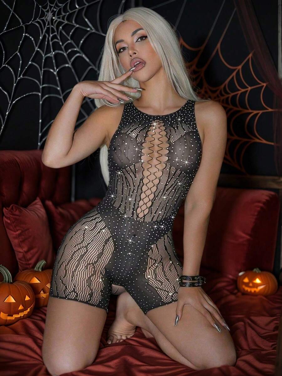 Black long sleeve fishnet bodysuit lingerie for women made with semi-sheer hollow out high stretch mesh fabric.
