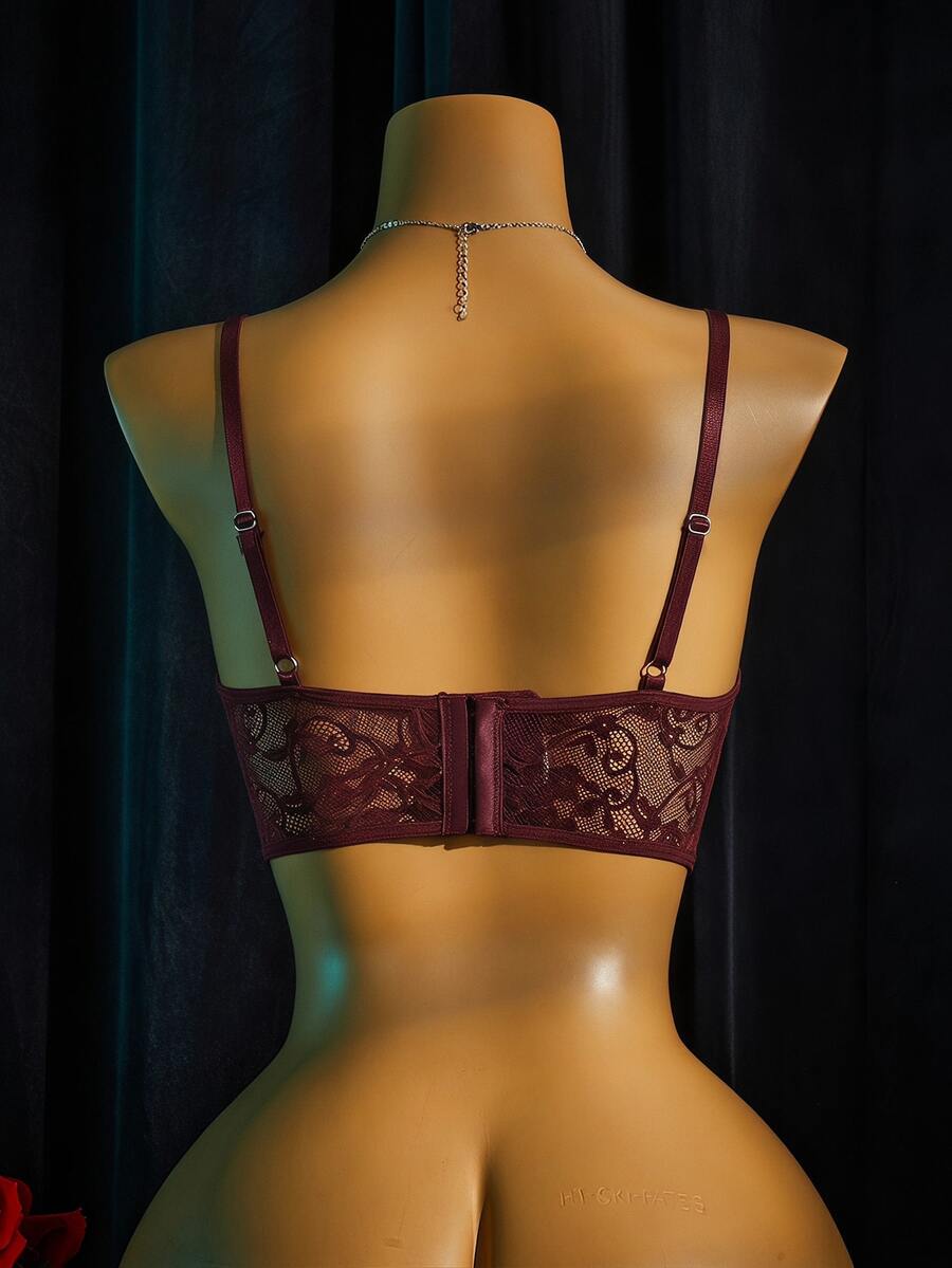 Women's sheer lace bralette lingerie set featuring a longline spaghetti strap bra top and matching mid-rise thong panty.