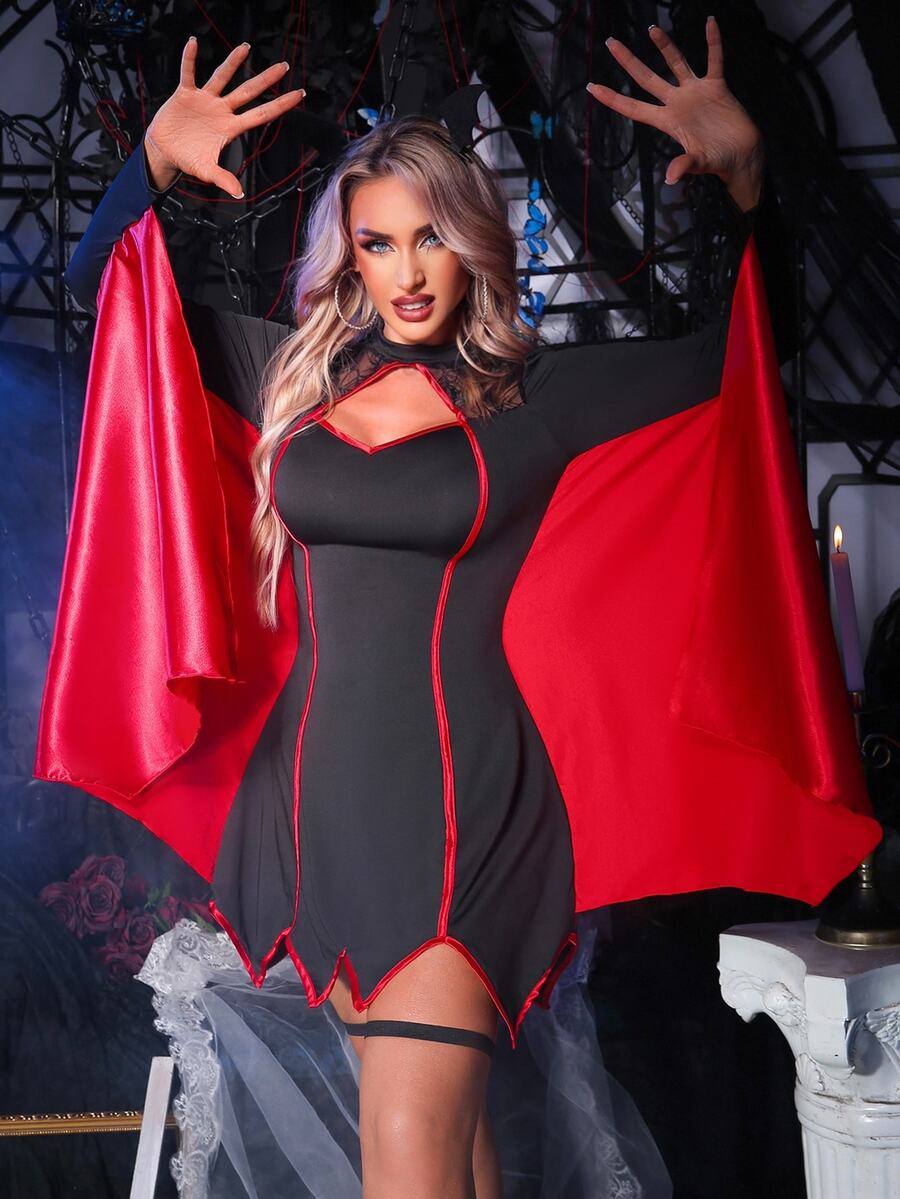 Women's black goth bat cape Halloween costume set featuring a short long-sleeve dress.