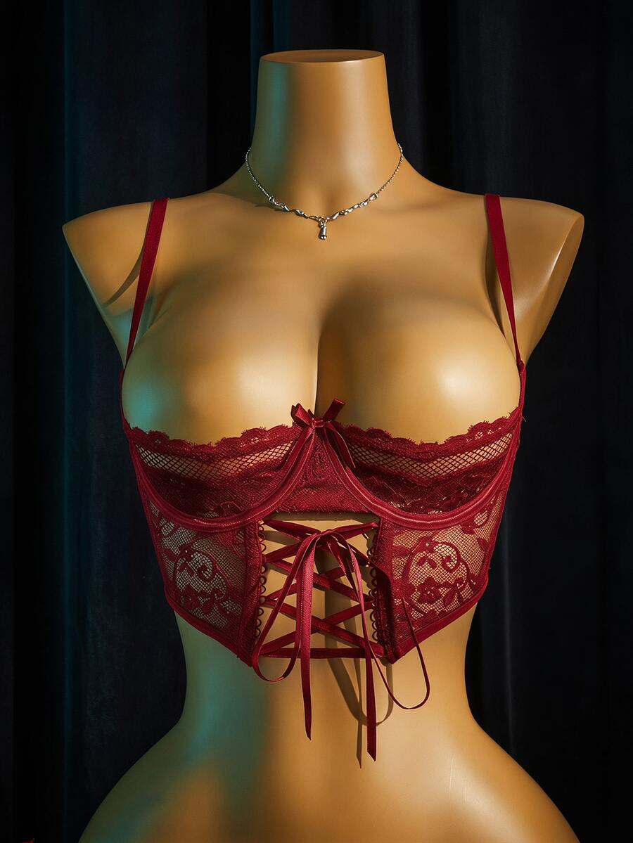 Women's sheer lace bralette lingerie set featuring a longline spaghetti strap bra top and matching mid-rise thong panty.