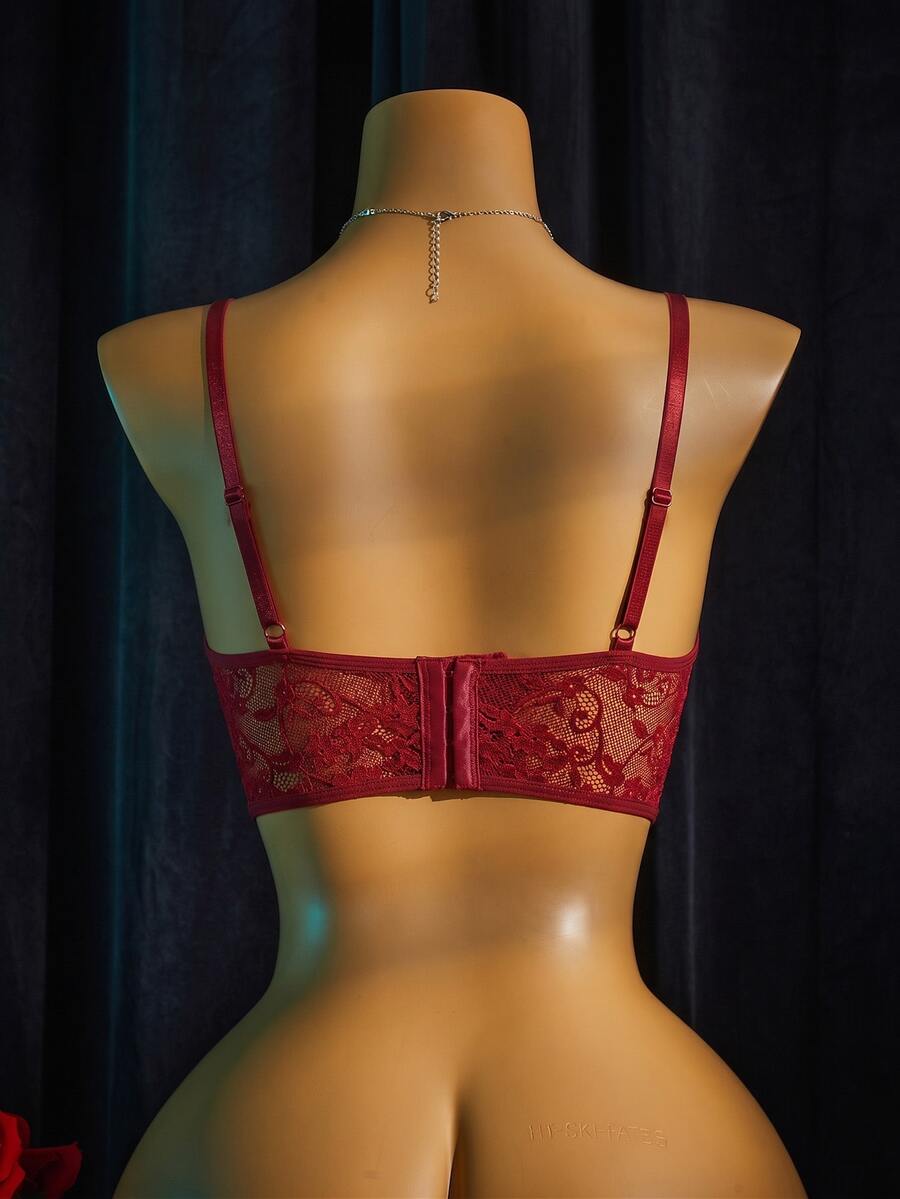 Women's sheer lace bralette lingerie set featuring a longline spaghetti strap bra top and matching mid-rise thong panty.