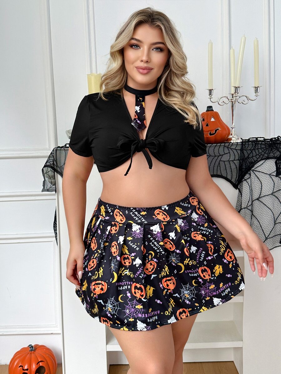Black 3-piece plus size Goth Halloween costume set featuring a short sleeve micro crop top with knot details and a knee-length pumpkin print pleated skirt.