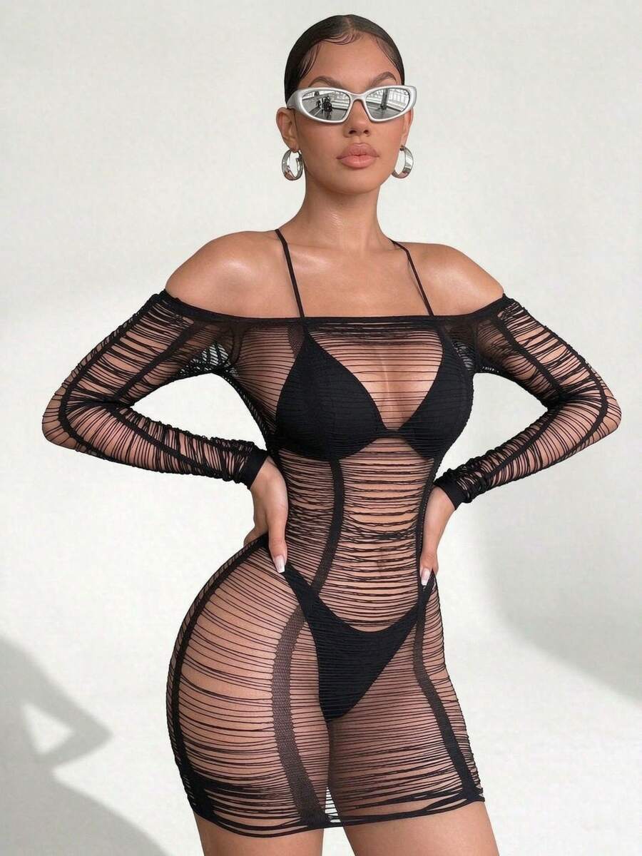 Women's black long sleeve fishnet cover-up mini dress featuring a hollow out sheer bodycon design