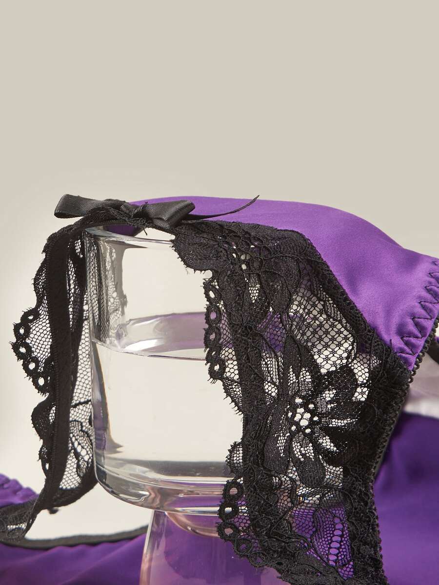 Purple 2-piece satin lingerie set featuring a push-up underwire bra with contrast lace trim, bow detail, adjustable shoulder straps, and matching low-rise briefs.