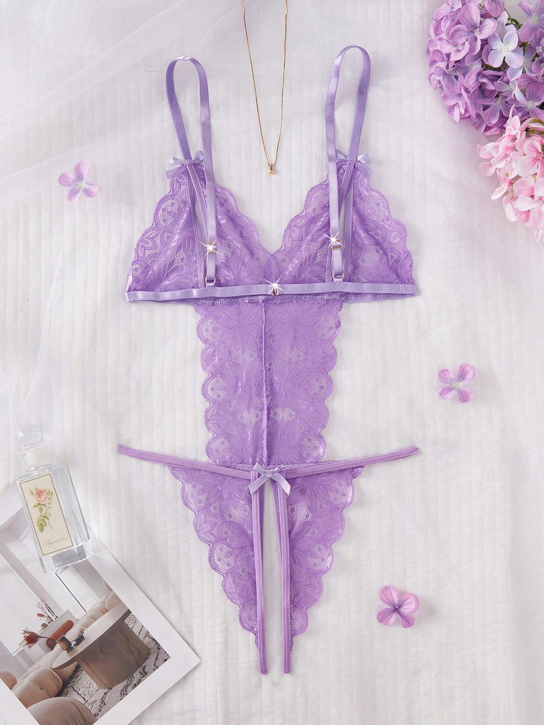 Women Purple Floral Lace One-Piece Bodysuit With Deep V-Neck Design, Sheer Contrast Lace Panels, Hollow Detail With Bow Accent, Open Back Structure, Lightweight Fabric Construction, Flexible Fit, Suitable For General Wear And Outfit Styling Use