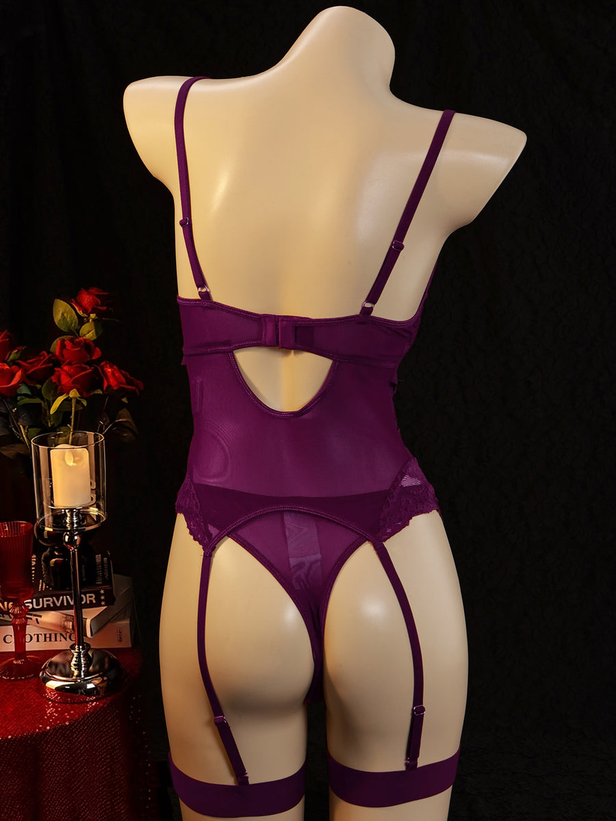 3-piece black lace lingerie set featuring a longline underwire 1/2 cup bra with adjustable spaghetti straps, cut out details, and matching low-rise thong